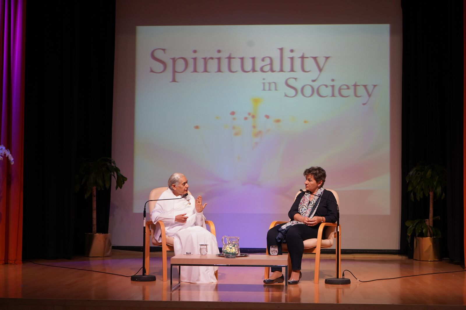 Sister Jayanti with Christiana Figueres speaking on "Spirituality in Society" during London Climate Action Week, (2019). 